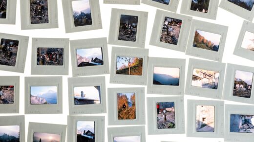 A bunch of pictures hanging on a wall
